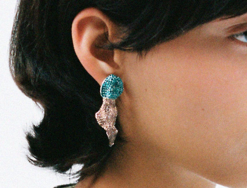 accessories earring jewelry adult female person woman face head gemstone